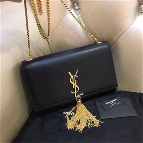 ysl black crossbody with tassel